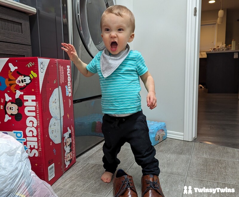 How Many Diapers For Newborn Twins Toddler With Huggies And Shocked Look On Face