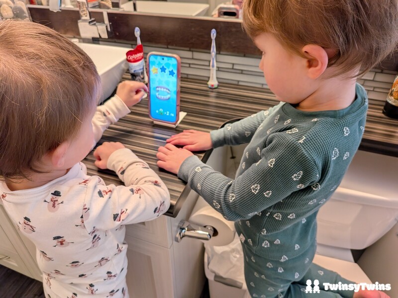 Kolibree Kids Toothbrush System Twin Toddlers Checking Out Brushing Game Results